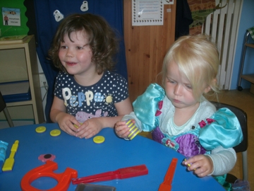 children enjoying playing with magnets